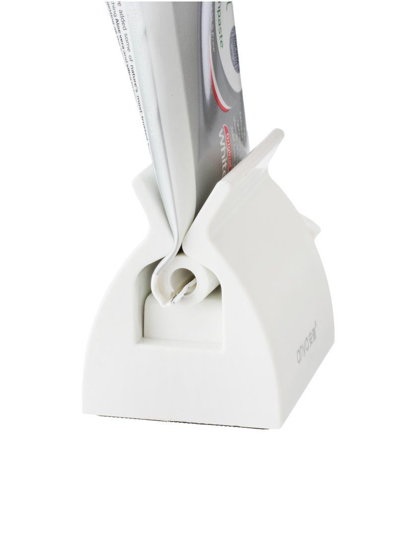 Plastic toothpaste squeeze tool