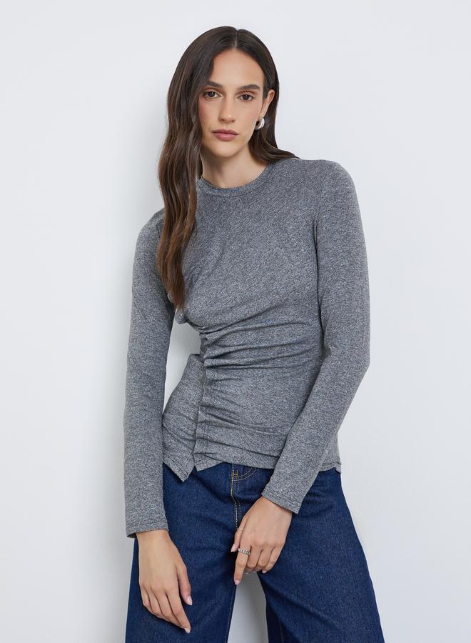 ستايلي بلوزة بأكمام طويلة وحافة غير متماثلة وتفاصيل مكشكشة - Image 1