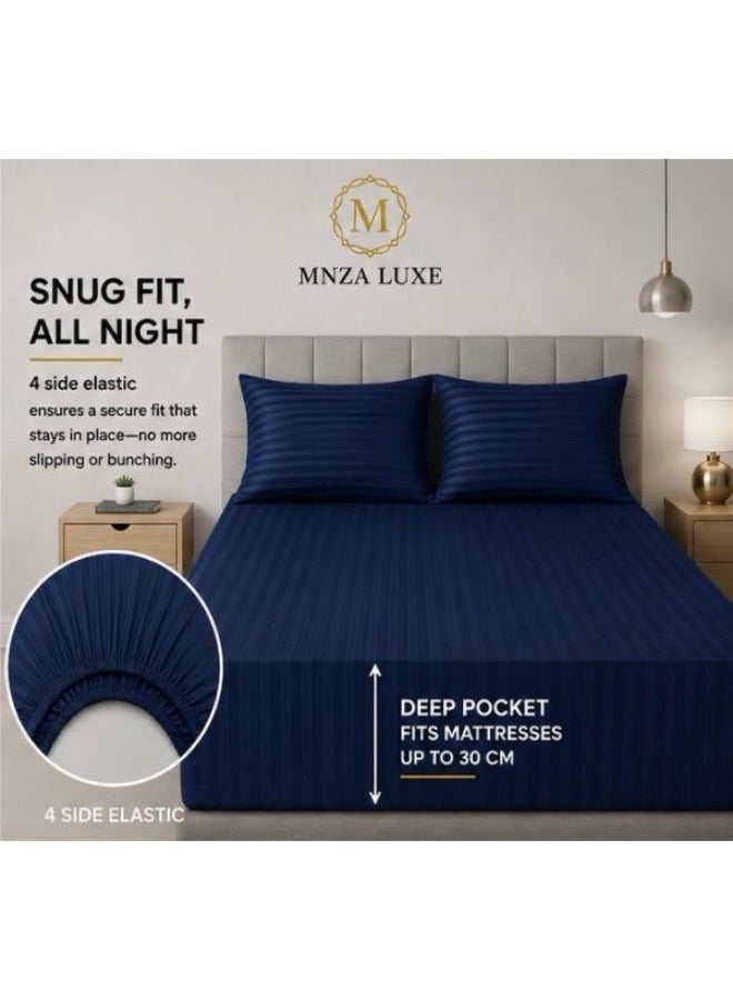 MNZA LUXE طقم شرشف سرير مطاطي من المايكروفايبر بتصميم خطوط 1 سم، يشمل شرشف سرير مطاطي واحد + 2 غطاء وسادة | فائق النعومة، قابل للتنفس ومقاوم للتجاعيد | لون أزرق كحلي - Image 1