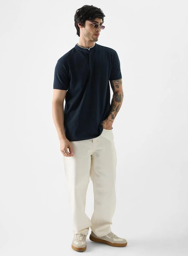 ذا سوليد ستور قميص بولو بياقة ماندارين