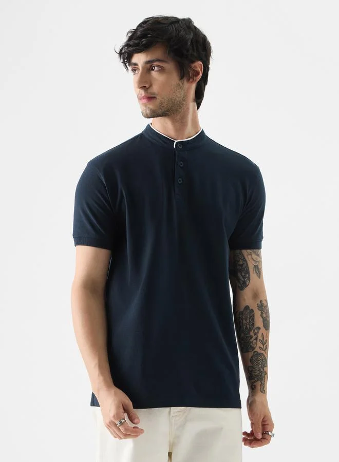 ذا سوليد ستور قميص بولو بياقة ماندارين