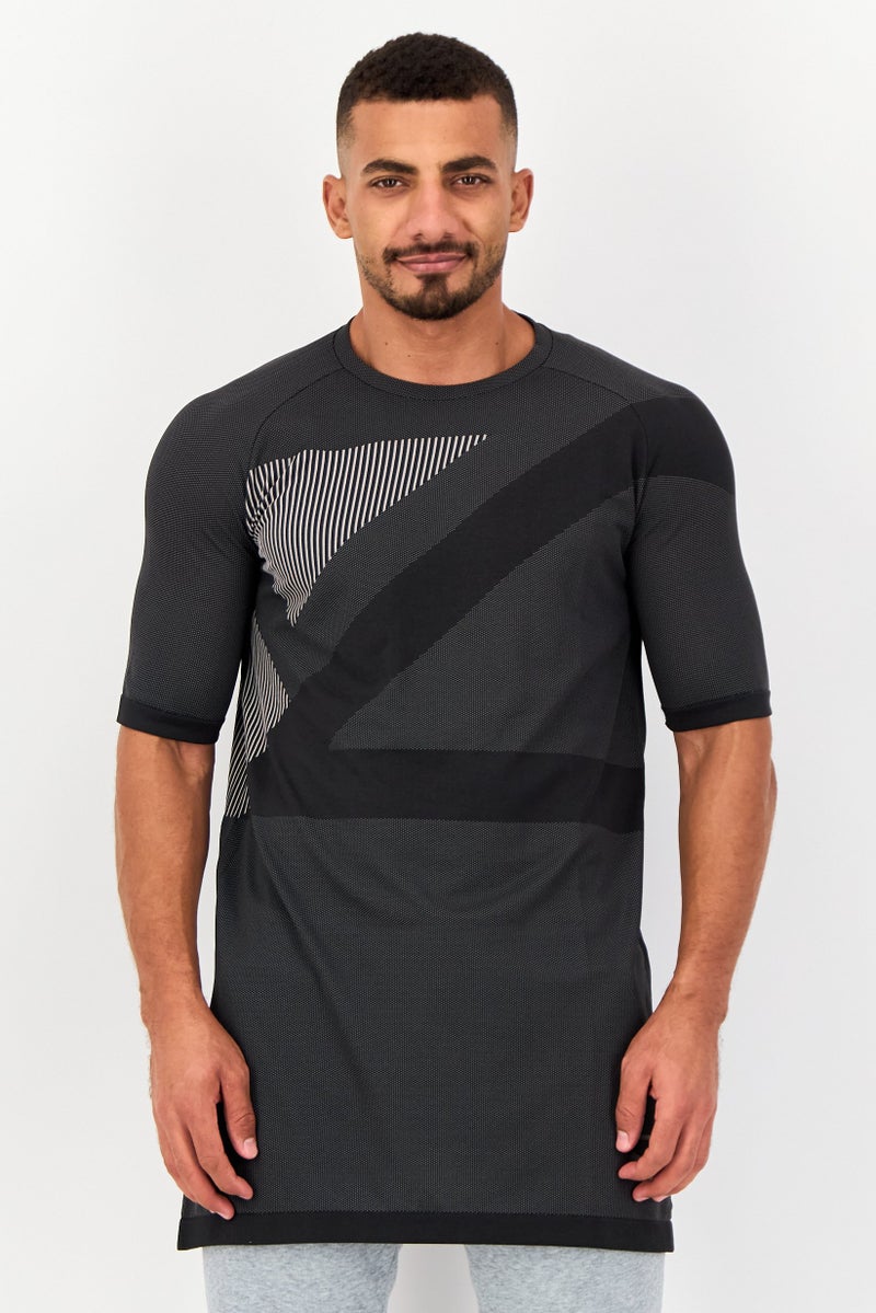 PUMA Men Sportswear Fit Short Sleeve Training T-Shirt, Heather Black - Image 1
