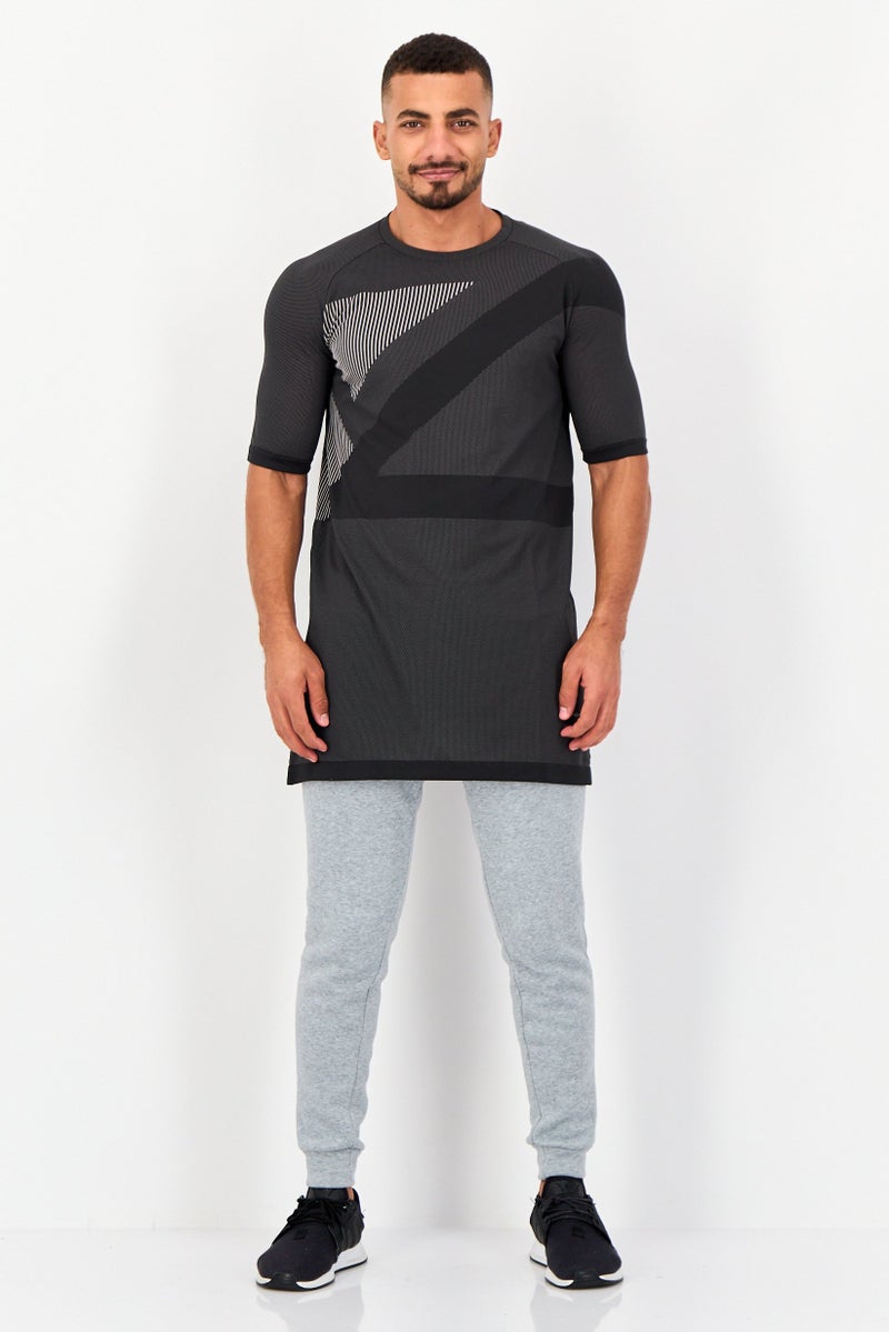 PUMA Men Sportswear Fit Short Sleeve Training T-Shirt, Heather Black - Image 4