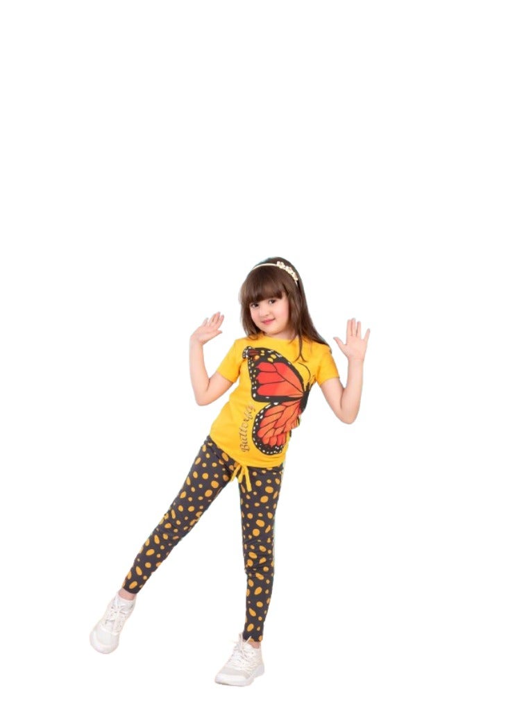 A girls' set with a mustard T-shirt with a drawing on it and dotted pants  - Image 2