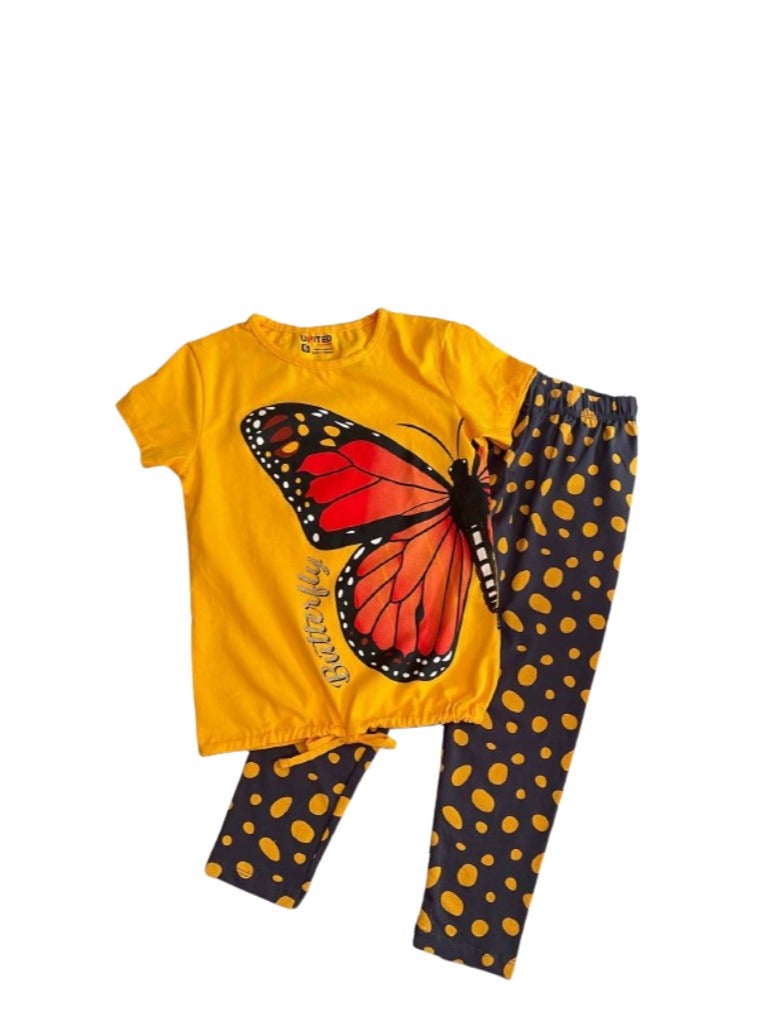 A girls' set with a mustard T-shirt with a drawing on it and dotted pants  - Image 1