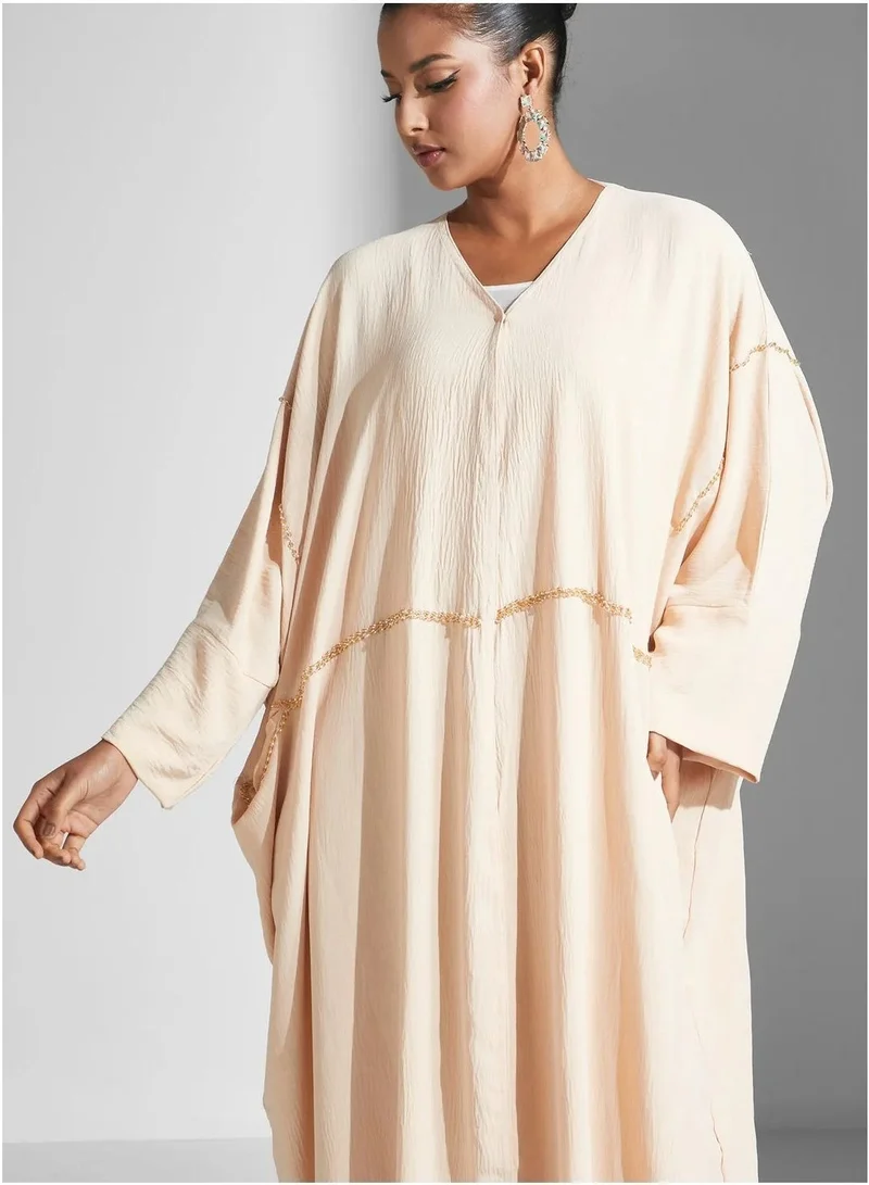 Aara Women's Cream Abaya with Wide Sleeves and Gold-Tone Detailing