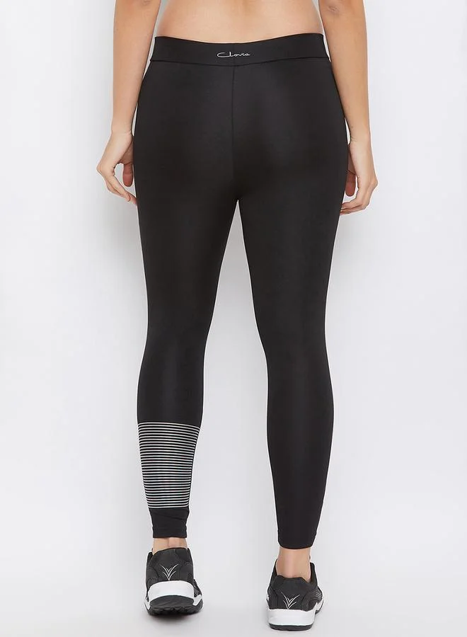 Clovia  Black Solid Performance Leggings for Women | Best Price UAE