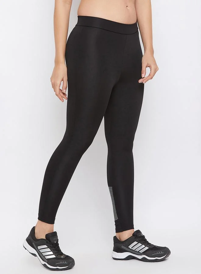 Clovia  Black Solid Performance Leggings for Women | Best Price UAE