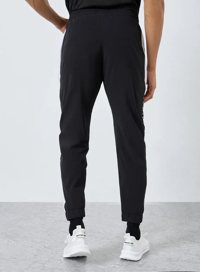 Styli Active Regular Fit Joggers with Side Panel and Print Detail