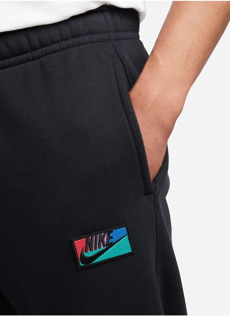 Nike - Club+ Patch Graphic Pants - Image 1