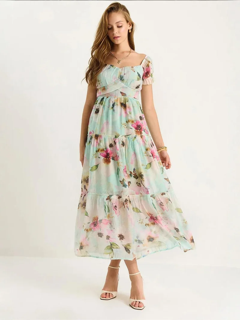 بيانكو لوتشي فستان ميدي من لوكسي بياقة على شكل قلب وطبعة زهور