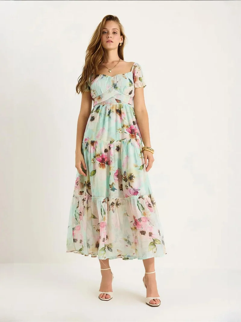 بيانكو لوتشي فستان ميدي من لوكسي بياقة على شكل قلب وطبعة زهور