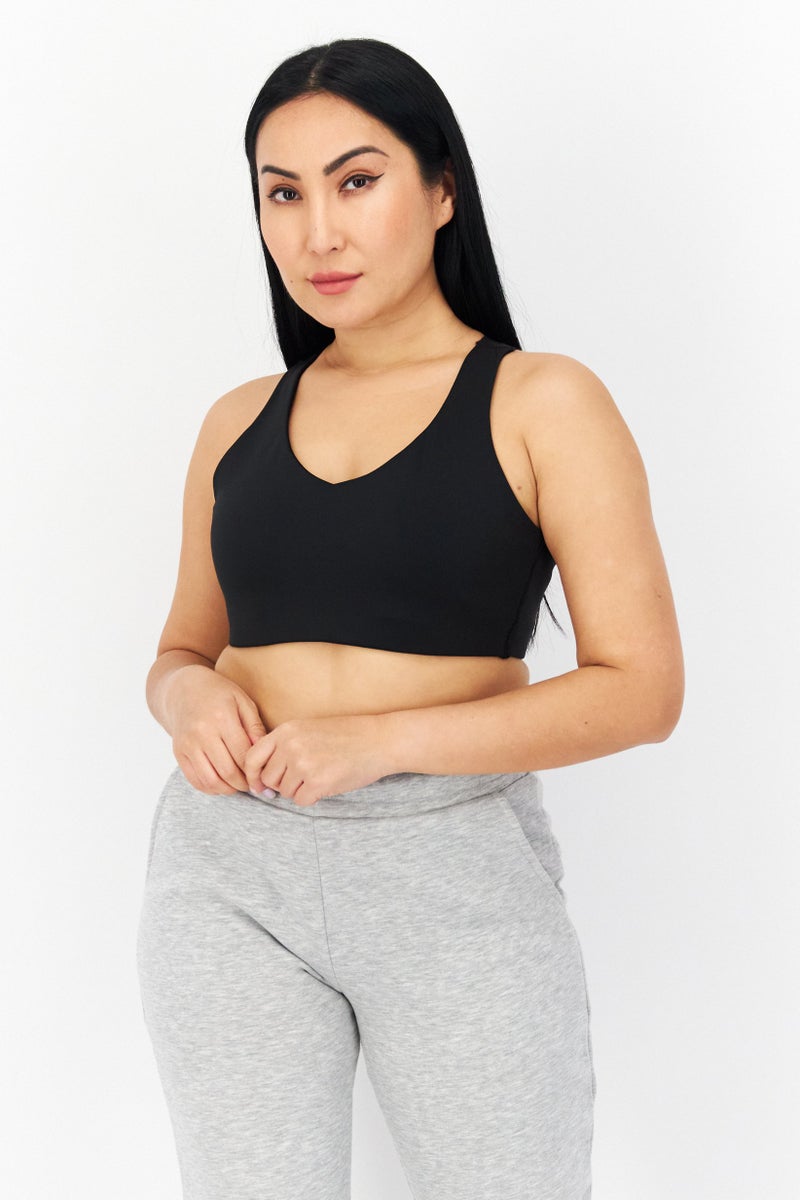 PUMA Women Lightly Padded Sports Bra, Black - Image 1
