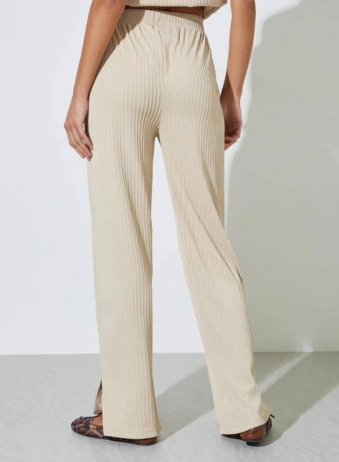 Styli  Cream Textured Knit Straight Leg Side Slit Pants for Women | Best Price UAE