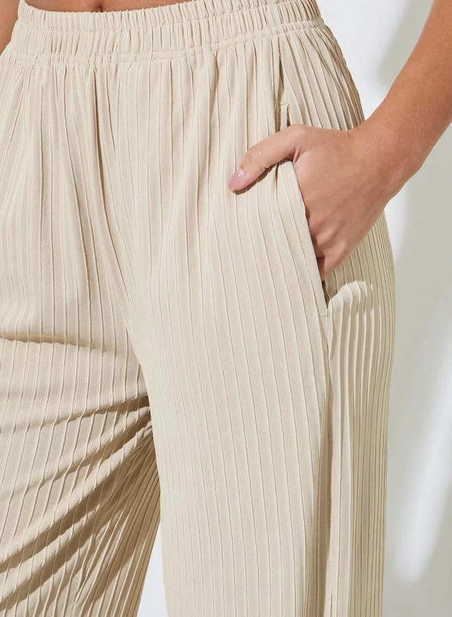 Styli  Cream Textured Knit Straight Leg Side Slit Pants for Women | Best Price UAE