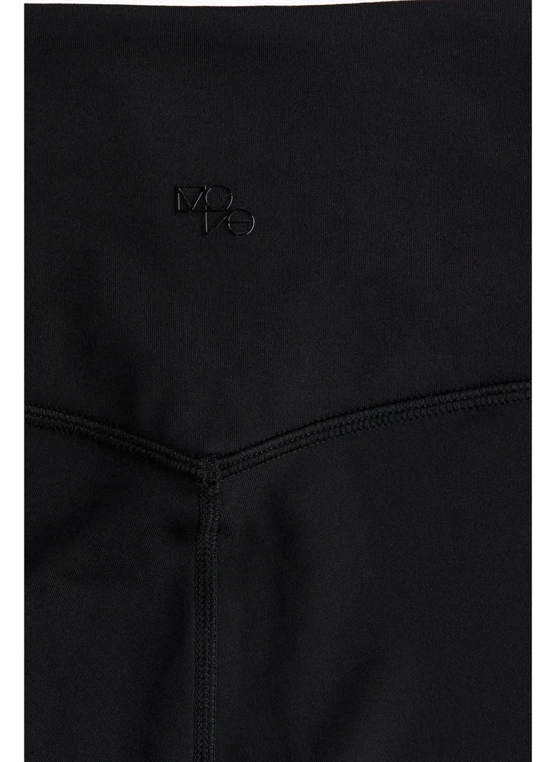 H&M Pocket-detail sports leggings in DryMove™