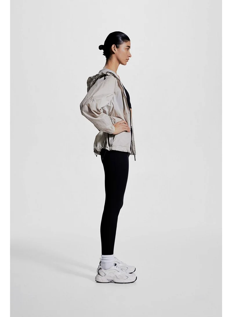 H&M Pocket-detail sports leggings in DryMove™
