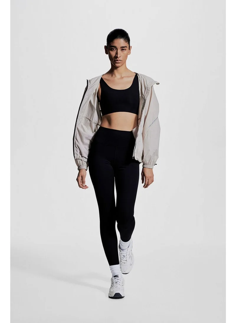 H&M Pocket-detail sports leggings in DryMove™