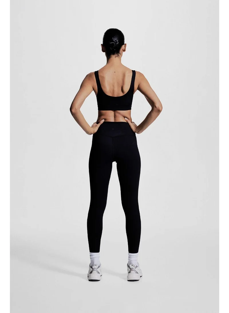 H&M Pocket-detail sports leggings in DryMove™