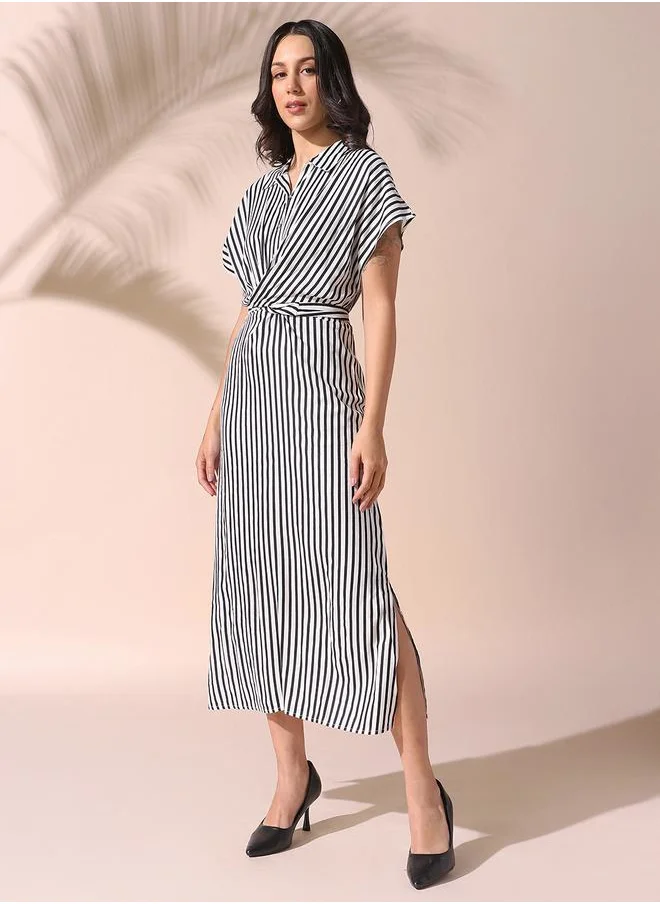 Dennis Lingo Women white regular fit striped half sleeves cotton blend dress with button closure featuring a spread collar- perfect for making bold moves.