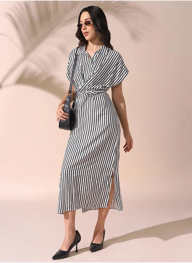 Dennis Lingo Women white regular fit striped half sleeves cotton blend dress with button closure featuring a spread collar- perfect for making bold moves.