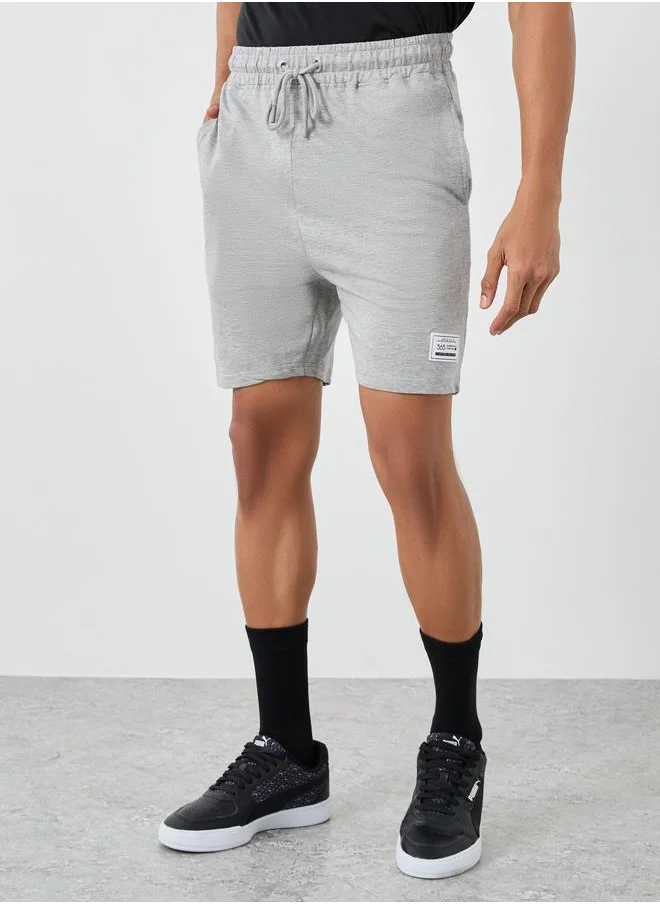 ستايلي Styli Badge Detail Regular Fit Terry Shorts