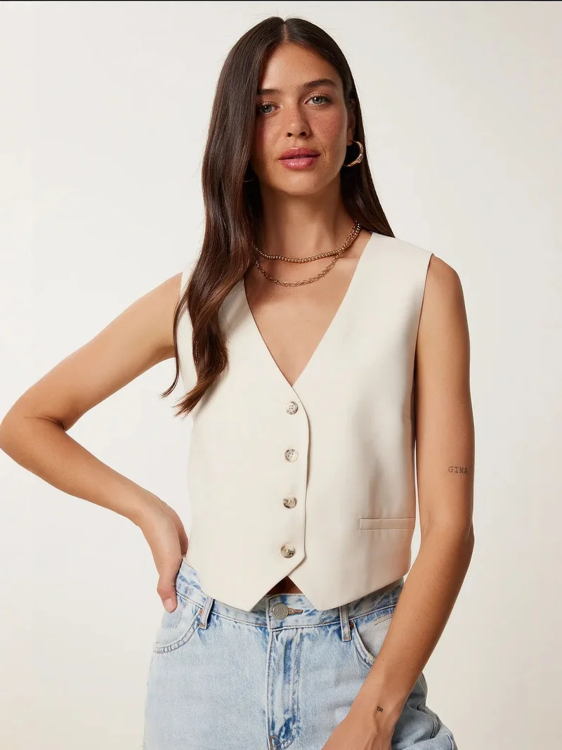 السعادة في إسطنبول ISTANBUL Sleeveless V-Neck Buttoned Crop Waistcoat