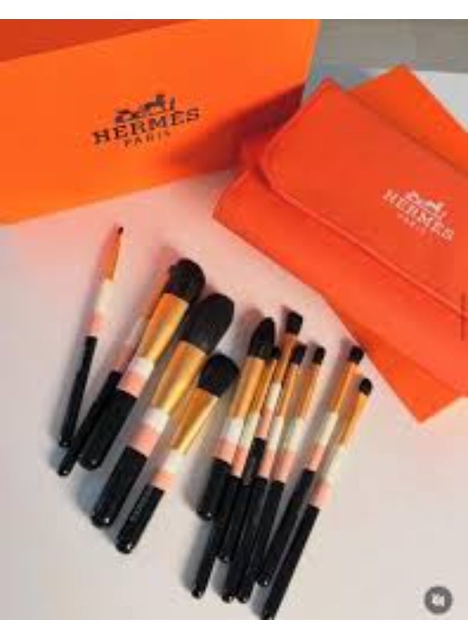 A makeup brush set inspired by Hermès, featuring a bag and case in the brand's signature orange.