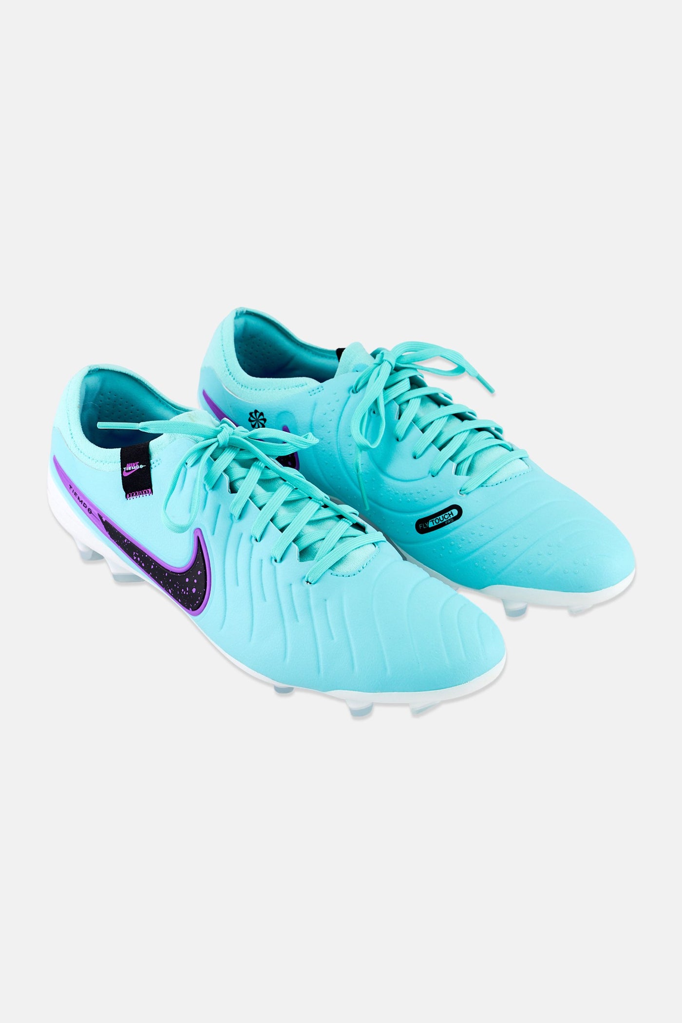 turquoise football cleats
