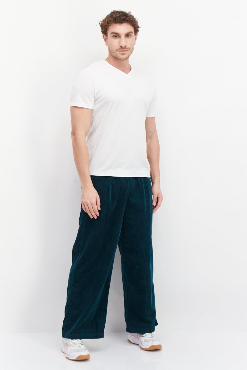 PUMA Men Sportswear Fit Wide Keg Outdoor Pants, Green - Image 4