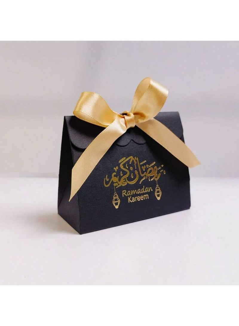 Ramadan giveaway boxes designed with the phrase “Ramadan Kareem” in black and with a golden ribbon. 10 boxes - Image 2