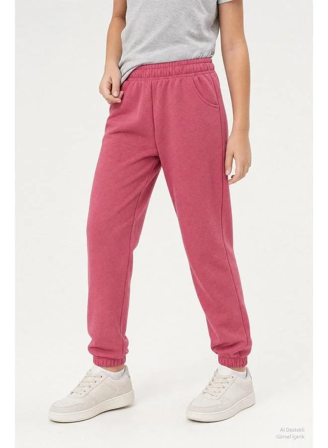 Perendi Elastic Comfortable Fit Pocketed Unisex Jogger Pants for Boys and Girls.