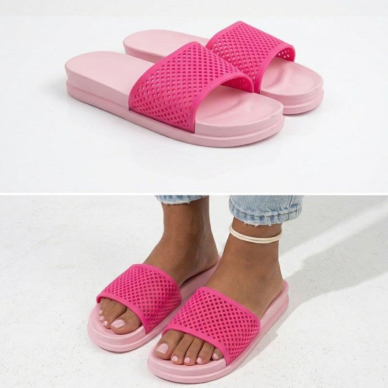 An elegant women's slide sandal featuring a classic two-tone color contrast. The footbed and outsole share a soft, subtle light shade, while the wide upper strap has a contrasting clean, bright light hue. This strap boasts a distinctive perforated mesh pattern for optimal breathability and airflow. Crafted from lightweight, flexible, and shock-absorbing EVA material, it offers all-day comfort.