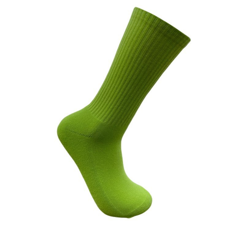 Generic Solid color towel bottom thick mens socks European and American street hip hop skateboard Sports Basketball cotton socks manufacturers wholesale Yellowish Green