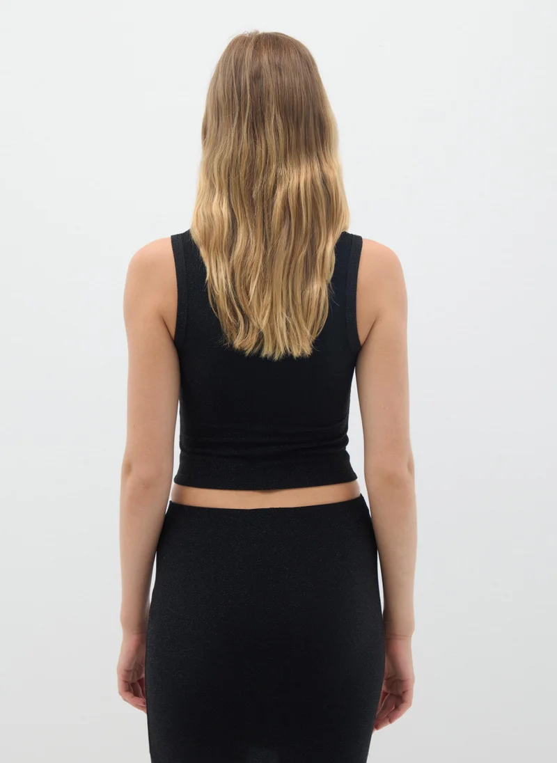 او في اس WOMEN'S BLACK STRETCH BLEND TOP