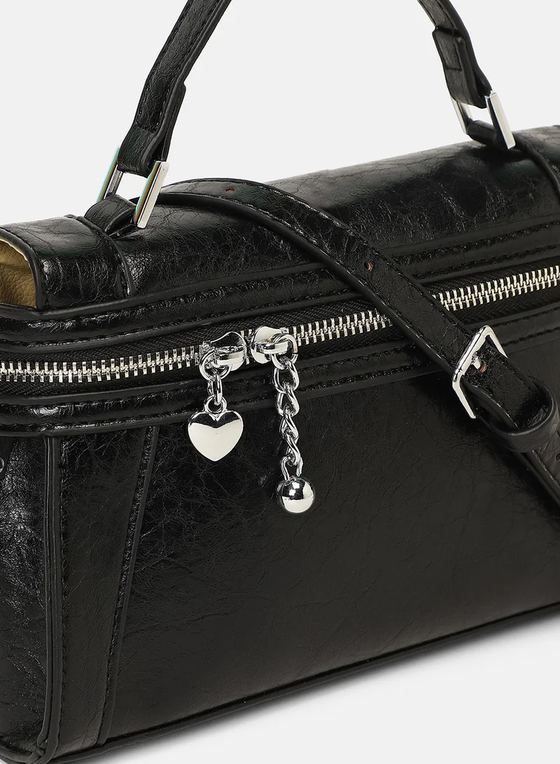 Haute Sauce Solid Zip Lock Regular Vegan Leather Sling Bag with Detachable Strap For Women