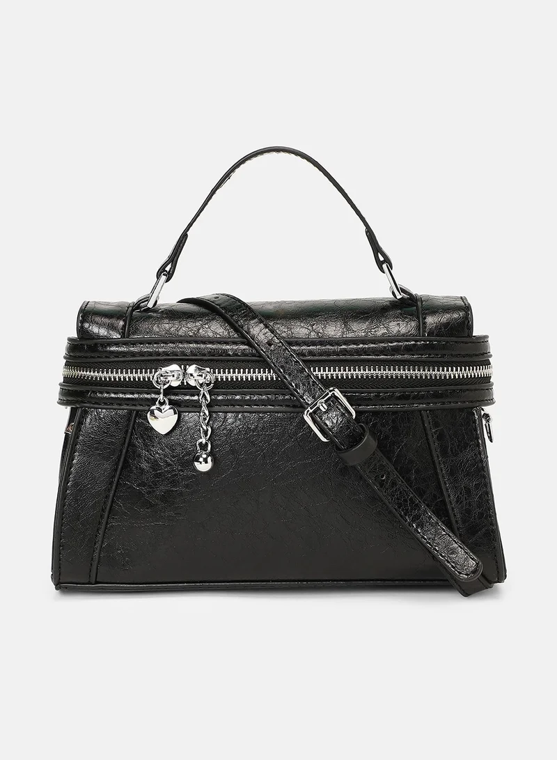 Haute Sauce Solid Zip Lock Regular Vegan Leather Sling Bag with Detachable Strap For Women