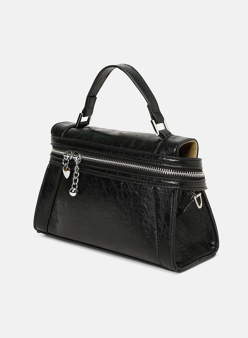 Haute Sauce Solid Zip Lock Regular Vegan Leather Sling Bag with Detachable Strap For Women