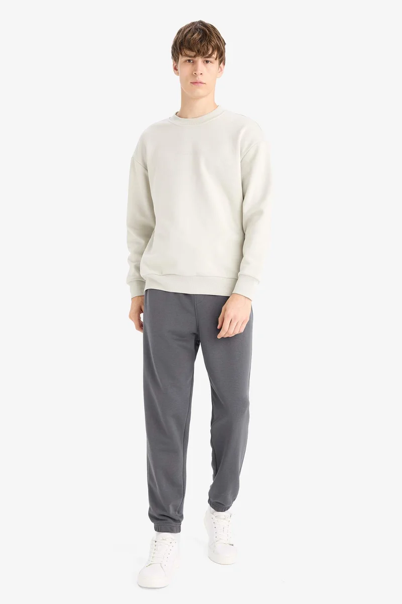 ديفاكتو Boxy Fit Printed Crew Neck Long Sleeve Sweatshirt