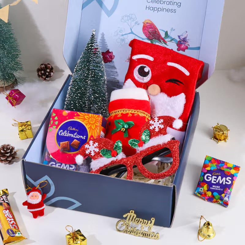 FlowerAura Secret Santa Gift Hamper - Mini Christmas Tree, Santa Cap, Christmas Sock, Chocolate Box, Glitter Glasses | Employee Gifting | Box For Family, Friends & Colleagues - Image 4