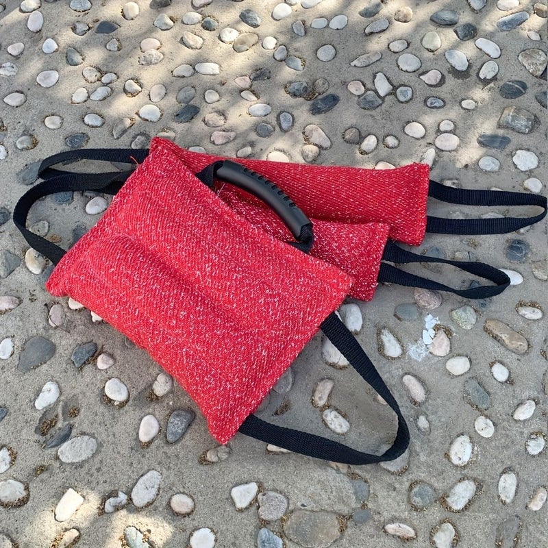 Red And White Dog Bite Training Pillow Set With Dual Handles And Tug Toy - Image 1