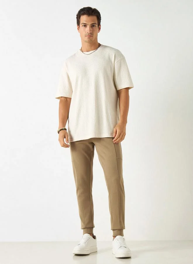 ايكونيك بنطلون رياضي سادة بقصة ضيقة ورباط إغلاق وجيوب من آيكونيك