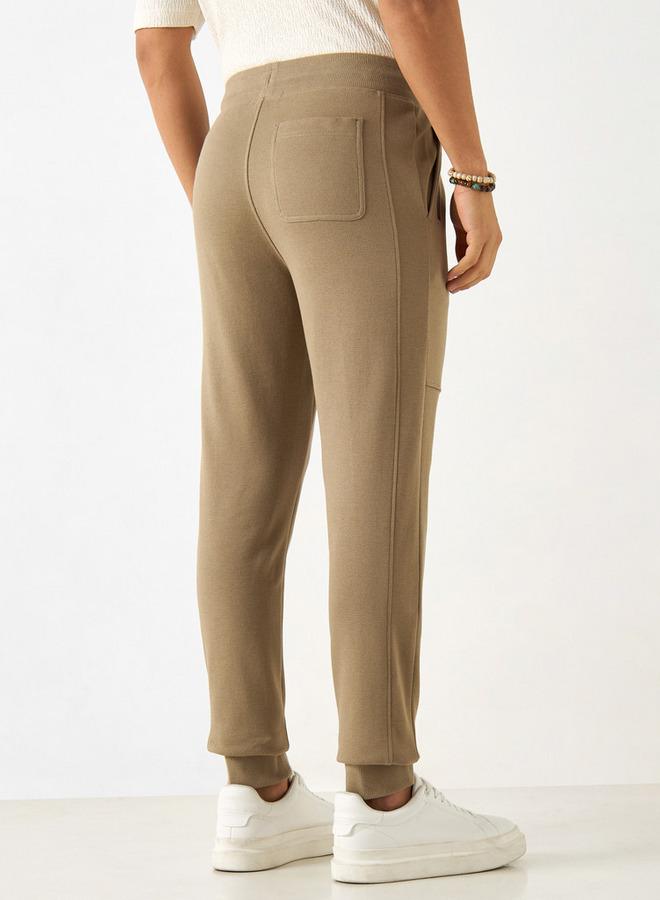 ايكونيك بنطلون رياضي سادة بقصة ضيقة ورباط إغلاق وجيوب من آيكونيك - Image 3