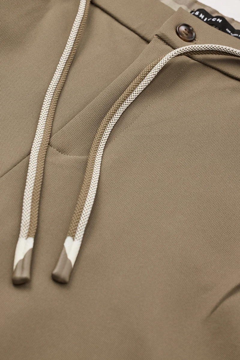 SNITCH بنطلون كاكي بخصر متوسط وقصة عادية