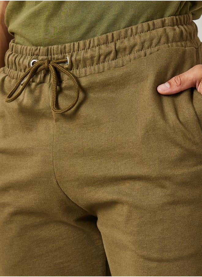 Styli - بنطال رياضي Eco-Earth Slim Fit Terry مع جيوب جانبية - Image 1