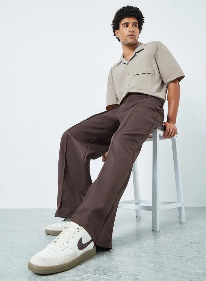 ستايلي بنطال واسع بجيوب وتصميم ألواح