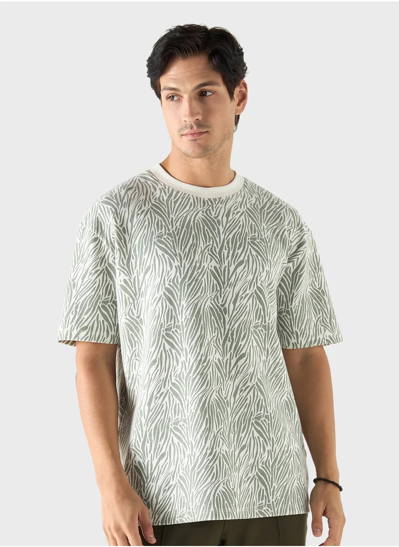 ايكونيك Iconic All-Over Print T-shirt with Crew Neck and Short Sleeves