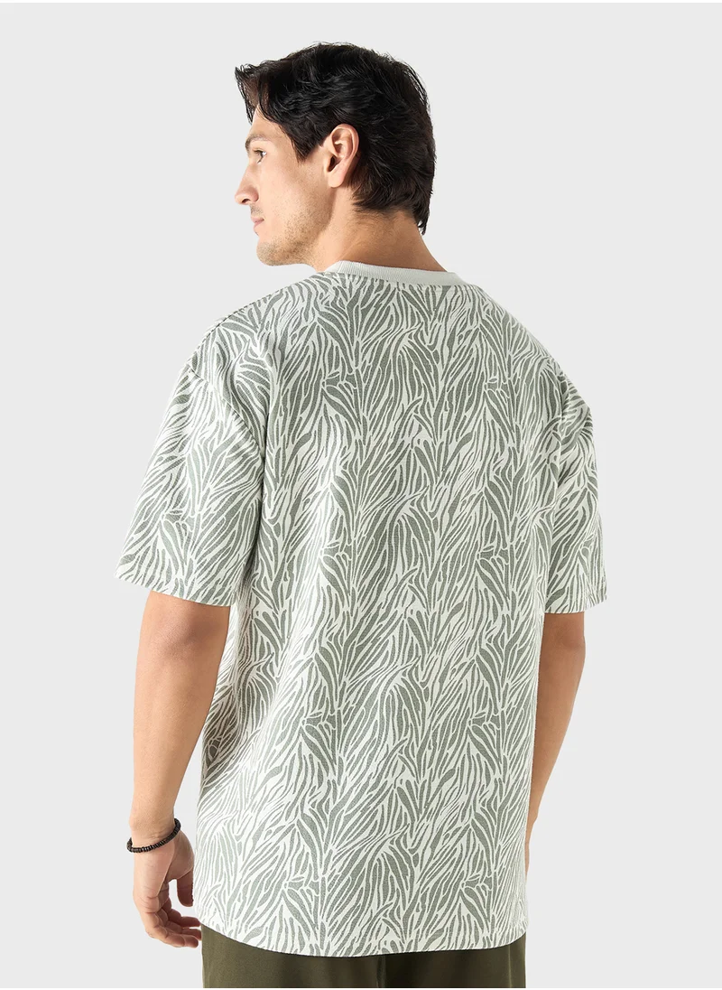 ايكونيك Iconic All-Over Print T-shirt with Crew Neck and Short Sleeves