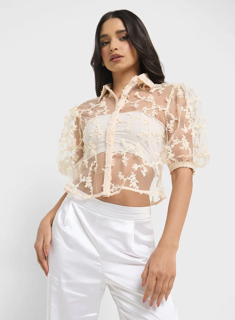 ايلا قميص شفاف بأزرار