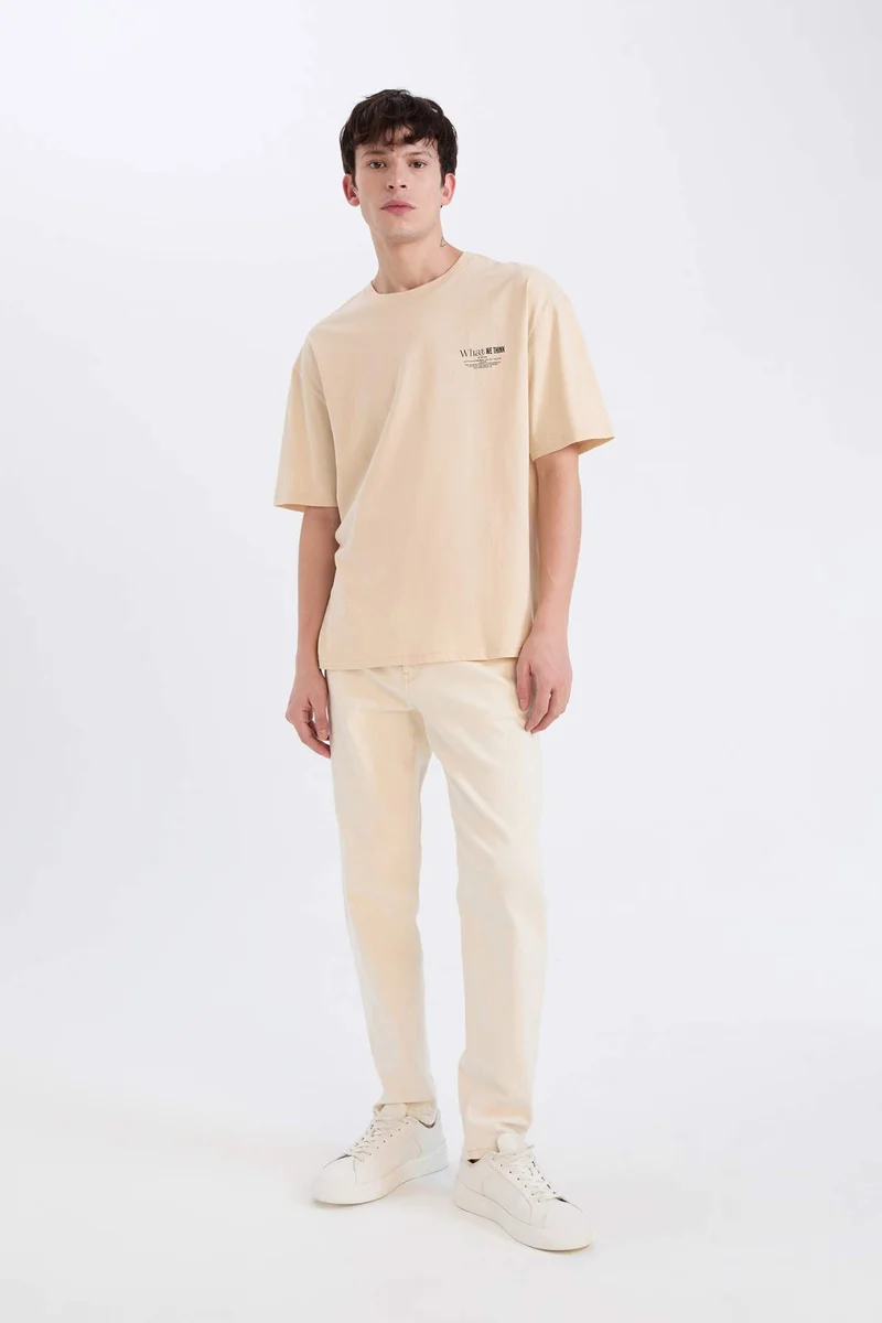 ديفاكتو Oversize Crew Neck Printed Short Sleeve T-Shirt